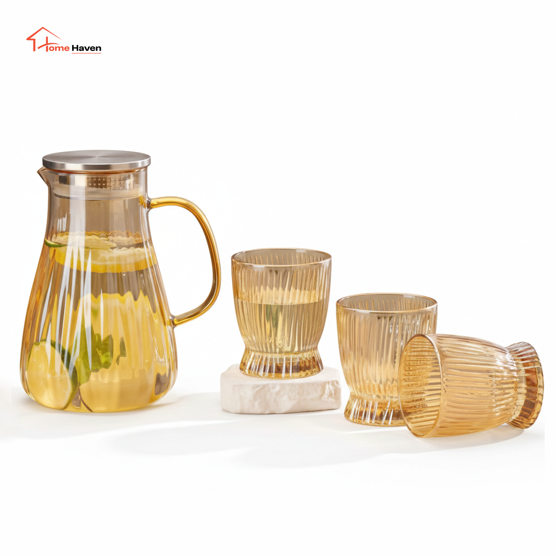Transparent glass jug and cups set front view